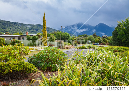 Residential street with mountains in Manapouri 138570525