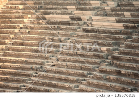 Part of an ancient amphitheater with a stone staircase. 138570819
