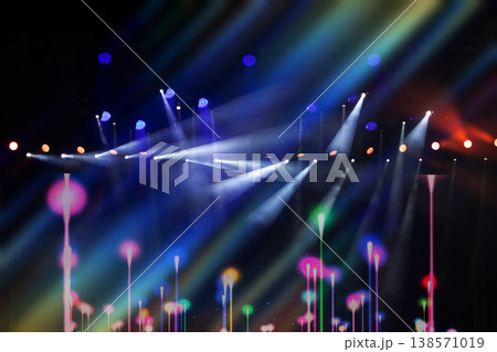 Colorful stage lights create an electrifying atmosphere during a live performance at night 138571019