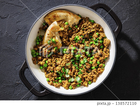 Indian keema matar with minced meat, peas and naan Indian keema matar with minced meat, peas and naan 138572110