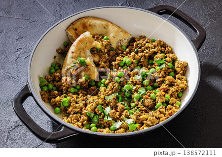 Indian keema matar with minced meat, peas and naan Indian keema matar with minced meat, peas and naan 138572111