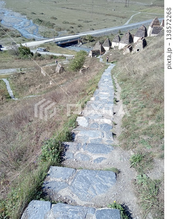 Stone staircase to the City of the Dead, Dargavs, North Ossetia, Russia. Ancient pathway leading up the mountain to the famous Alanian crypts Stone staircase to the City of the Dead, Dargavs, North Ossetia, Russia. Ancient pathway leading up the mountain to the famous Alanian crypts 138572268