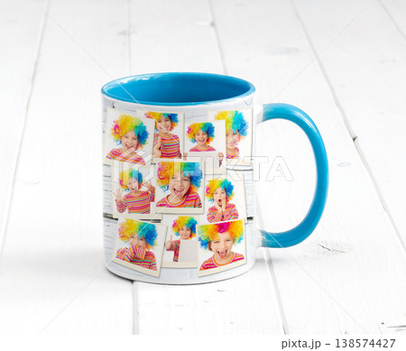 Lovely cup blue on the inside with light blue handle and a print, smily clowns Lovely cup blue on the inside with light blue handle and a print, smily clowns 138574427