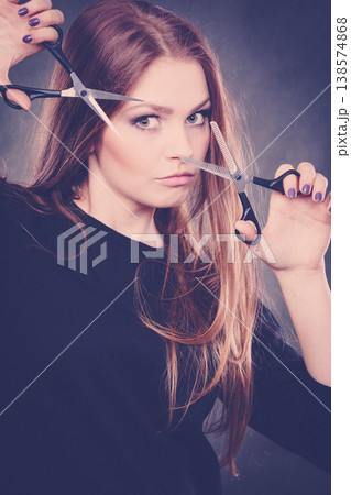 Female hairstylist barber with scissors. Female hairstylist barber with scissors. 138574868
