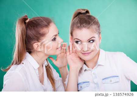 Two teenagers shares secrets, gossip 138574926
