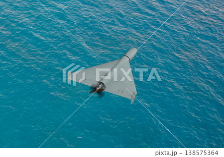 Military drone performs attack mission over sea area of Middle East region Military drone performs attack mission over sea area of Middle East region 138575364
