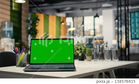 Chroma key isolated display shown on a modern laptop in the office, empty business workspace for the human resources department prepared for hiring process and interviews. Chroma key. 138576915