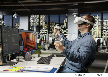 Professional male developer operating VR glasses to create spaceship station as game lobby, gaming development for the industry. AI generating modern spatial project on dual monitors. Professional male developer operating VR glasses to create spaceship station as game lobby, gaming development for the industry. AI generating modern spatial project on dual monitors. 138576938