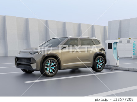 ESS蓄電システムが備えた充電ステーションに充電中の電動SUVのイメージ 138577209