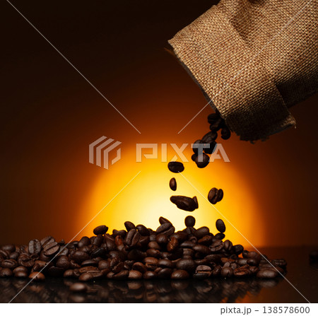 Strong cup of coffee need to start my day and feel energized. Roasted coffee cup beans provided perfect energy boost to get me through working hard on sun set and long night Strong cup of coffee need to start my day and feel energized. Roasted coffee cup beans provided perfect energy boost to get me through working hard on sun set and long night 138578600