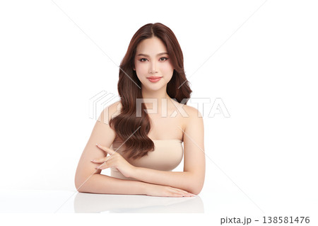 A beautiful young Asian woman with clean, fresh skin against a white background. Skincare, facial treatment, cosmetology, beauty, and spa. An elegant portrait of an Asian woman. A beautiful young Asian woman with clean, fresh skin against a white background. Skincare, facial treatment, cosmetology, beauty, and spa. An elegant portrait of an Asian woman. 138581476