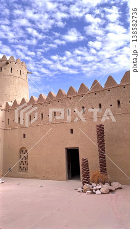 Generous Earth Courtyard Under Azure Sky With Ancient Fortress Features. Spacious Earthen Open Space Showcasing Historic Fortifications And Tranquil Midday Illumination Generous Earth Courtyard Under Azure Sky With Ancient Fortress Features. Spacious Earthen Open Space Showcasing Historic Fortifications And Tranquil Midday Illumination 138582736