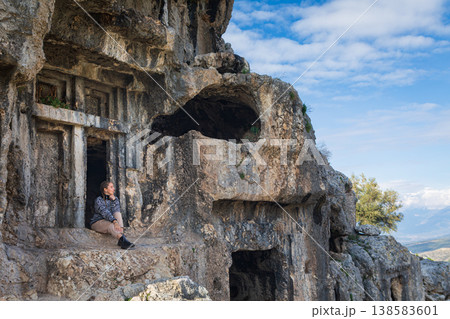 Happy family visiting ancient Greek city Tlos in Lycia located on Lycian way Famous historical and archeological site. Popular place for family travel on summer vacation. Fethiye, Mugla, Turkey Happy family visiting ancient Greek city Tlos in Lycia located on Lycian way Famous historical and archeological site. Popular place for family travel on summer vacation. Fethiye, Mugla, Turkey 138583601
