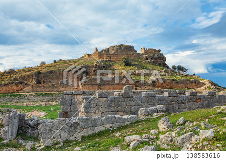 Stadium, acropolis of ancient Greek city Tlos in Lycia located on Lycian way. Famous historical site In Antalya region. Popular place for family travel on summer vacation. Fethiye, Turkey Stadium, acropolis of ancient Greek city Tlos in Lycia located on Lycian way. Famous historical site In Antalya region. Popular place for family travel on summer vacation. Fethiye, Turkey 138583616