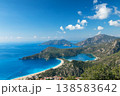 Beautiful view of Oludeniz beach, blue lagoon with turquoise water, Lycia coast from high cliff. Summer day walk by Lycian way at family vacation in Mediterranean Sea, Fethye, Antalya region, Turkey 138583642