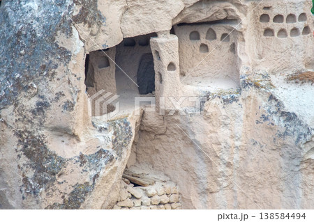 Ancient rock-cut homes found in the Andes mountains during the afternoon sunlight near Ancient rock-cut homes found in the Andes mountains during the afternoon sunlight near 138584494