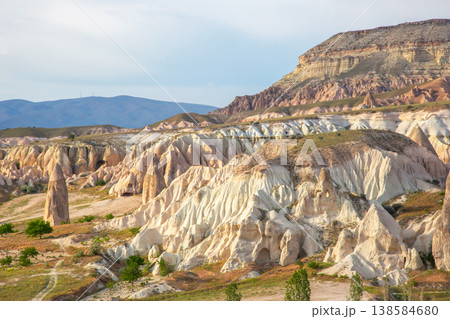 Rock formations in Cappadocia with unique shapes and colors during daylight Rock formations in Cappadocia with unique shapes and colors during daylight 138584680