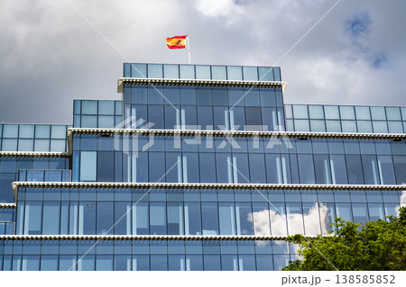 Skyscraper with American flag. Modern glass building. Skyscraper in business city. City downtown with skyscraper. Office building in business district. Brickell Key. Skyscraper building architecture 138585852