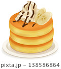 皿にのったバナナとホイップクリームのパンケーキ 138586864