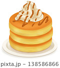 皿にのったホイップクリームとキャラメルソースのパンケーキ 138586866