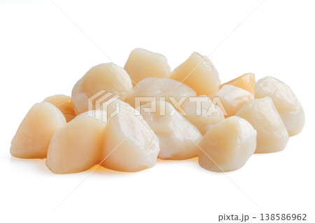 Scallops are displayed in a pile ready for cooking and serving to enjoy fresh seafood meals 138586962