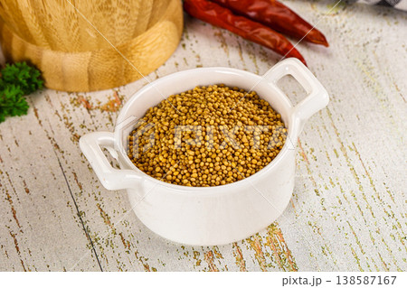 Dry mustard seeds in the bowl 138587167