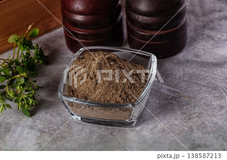 Ground dry black pepper powder Ground dry black pepper powder 138587213
