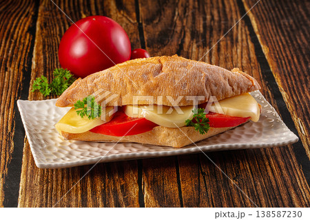 Sandwich with mozzarella and tomato 138587230