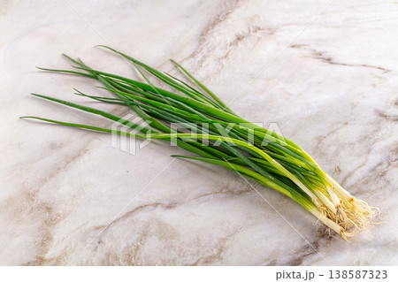 Raw young fresh green onion Raw young fresh green onion 138587323