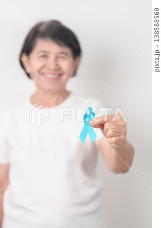 Elderly with blue Ribbon for Prostate Cancer Awareness month, April Child Abuse Prevention, National Bullying, September Addiction Recovery, May Chronic Fatigue Syndrome and January Human Trafficking Elderly with blue Ribbon for Prostate Cancer Awareness month, April Child Abuse Prevention, National Bullying, September Addiction Recovery, May Chronic Fatigue Syndrome and January Human Trafficking 138588569