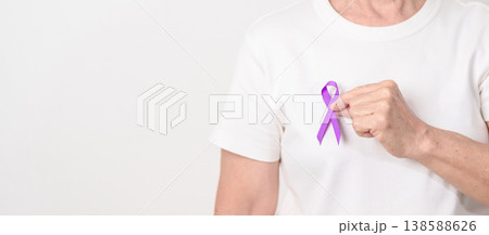 Elderly with Purple Ribbon for Violence, Pancreatic, Esophageal, Testicular cancer, Alzheimer, Epilepsy, Lupus, Crohn, Thyroid,  Sarcoidosis and Fibromyalgia. Awareness month and World cancer day 138588626