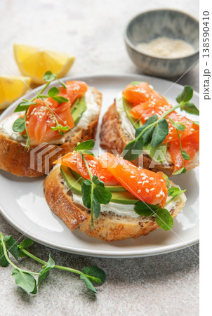 Smoked salmon toast with avocado, cream cheese, and microgreens Smoked salmon toast with avocado, cream cheese, and microgreens 138590410