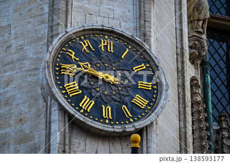 Historic tower clock with gold roman numerals Historic tower clock with gold roman numerals 138593177