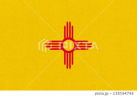 American state New Mexico flag on fabric surface. New Mexico state flag 138594748