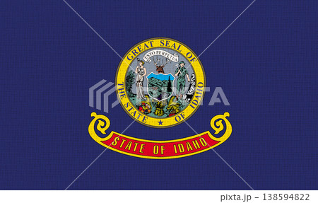 Flag of American state Idaho on fabric surface. Idaho state flag 138594822