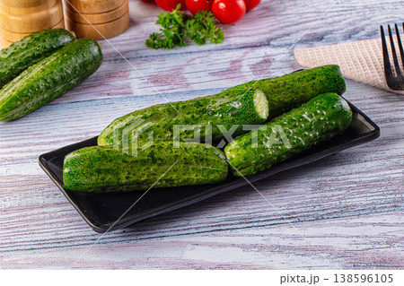 Homemade lightly salted cucumbers snack Homemade lightly salted cucumbers snack 138596105