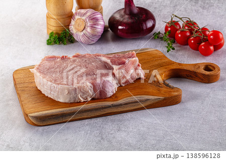 Raw pork steak with bone Raw pork steak with bone 138596128