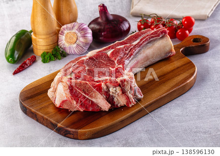 Raw prime beef steak with bone Raw prime beef steak with bone 138596130