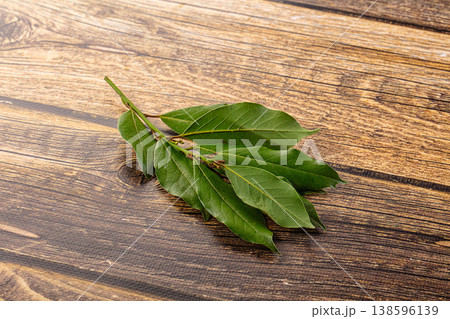 Fresh green laurel leves for cooking Fresh green laurel leves for cooking 138596139