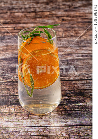 Orange cold lemonade with tarragon Orange cold lemonade with tarragon 138596141