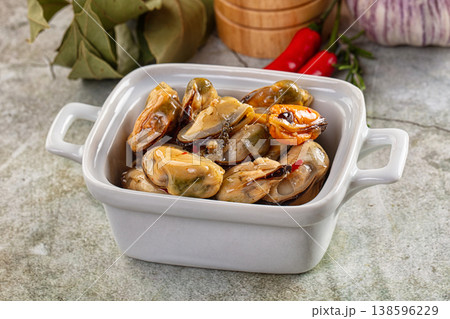 Canned mussels in oil and spices Canned mussels in oil and spices 138596229