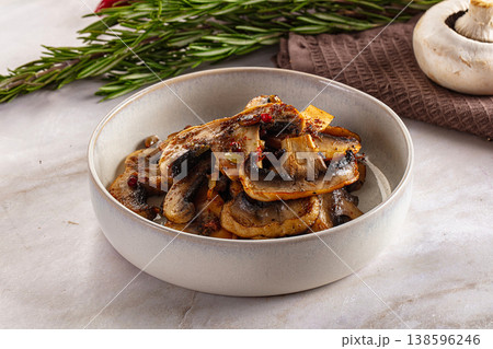 Vegan cuisine - roasted champignon slices Vegan cuisine - roasted champignon slices 138596246
