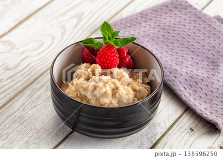 Oat porridge with raspberry Oat porridge with raspberry 138596250