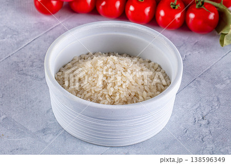 Raw dry white rice grain Raw dry white rice grain 138596349