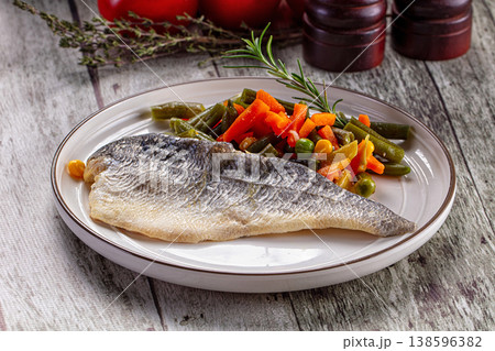 Steamed seabass fish fillet with vegetables Steamed seabass fish fillet with vegetables 138596382