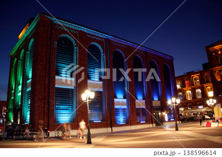 Light illumination in city. Night street with beautiful illuminated building Light illumination in city. Night street with beautiful illuminated building 138596614