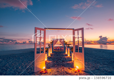 Radiant dreamy sandbank beach wedding elegant candles decoration romance love, majestic sunset ocean sky honeymoon destination, captivating breathtaking tropical couple travel design wallpaper  art 138596710