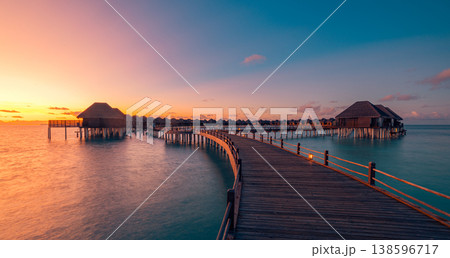 Breathtaking picturesque maldives water villas pier calm ocean lagoon, radiant sunset sky clouds, gorgeous luxury summer resort, perfect tourism travel tropical landscape background wallpaper 138596717