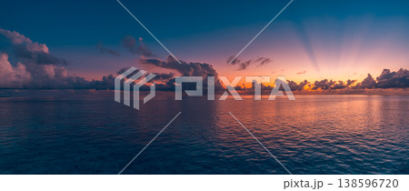 Breathtaking panoramic magnificent sunset ocean with gorgeous majestic sky and dramatic clouds, radiant inspiring nature outdoors wallpaper banner and dreamy captivating colorful horizon landscape Breathtaking panoramic magnificent sunset ocean with gorgeous majestic sky and dramatic clouds, radiant inspiring nature outdoors wallpaper banner and dreamy captivating colorful horizon landscape 138596720