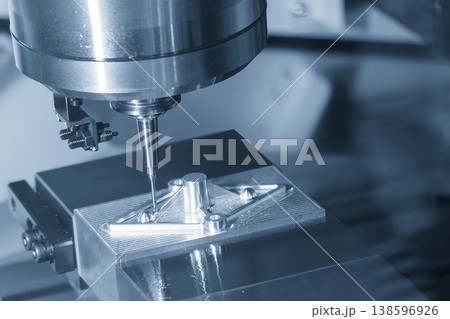 High-precision CNC milling machine using a small cutting tool for aerospace part production in a light blue tech scene. High-precision CNC milling machine using a small cutting tool for aerospace part production in a light blue tech scene. 138596926